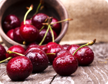 Red cherries in a bowl